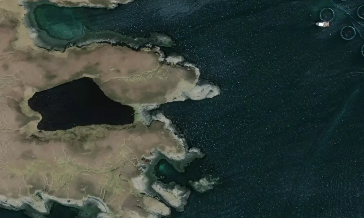 Flodday: Flyfoto av A small island off Lochmaddy